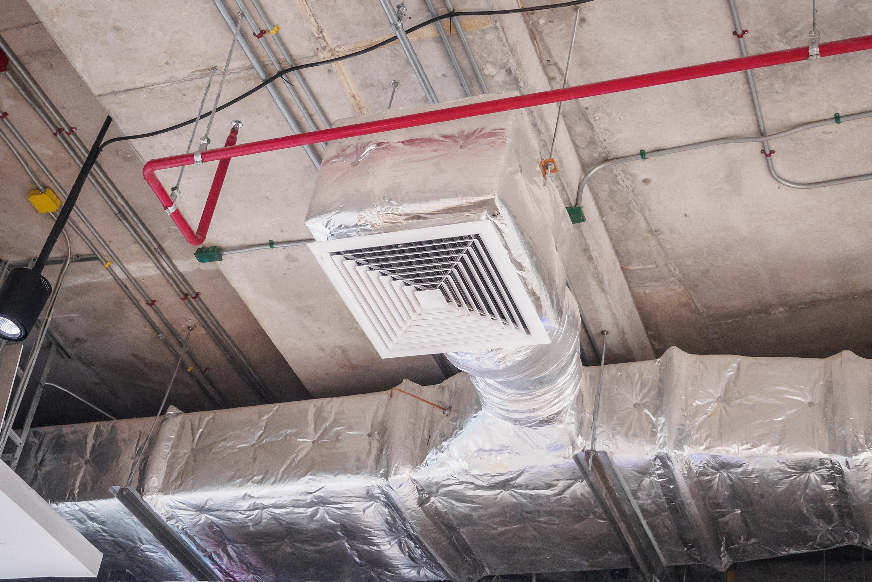 Insulated ductwork in a commercial facility, part of a comprehensive HVAC service in Nashville.